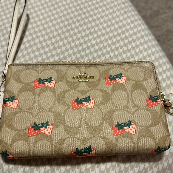 Coach Handbags - Tan multi colored wallet wristlet used once